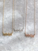 Fancy Leaves Necklace: available in silver, gold, and rose gold.